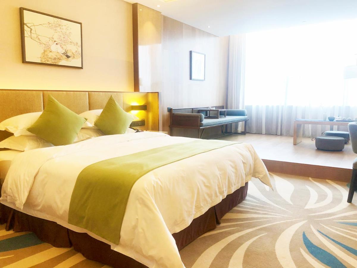 Leshan Ramada Hotel Exterior foto