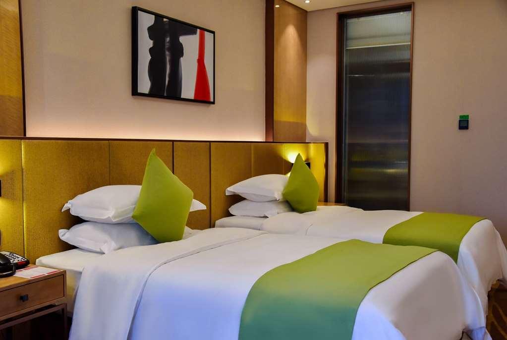 Leshan Ramada Hotel Habitación foto