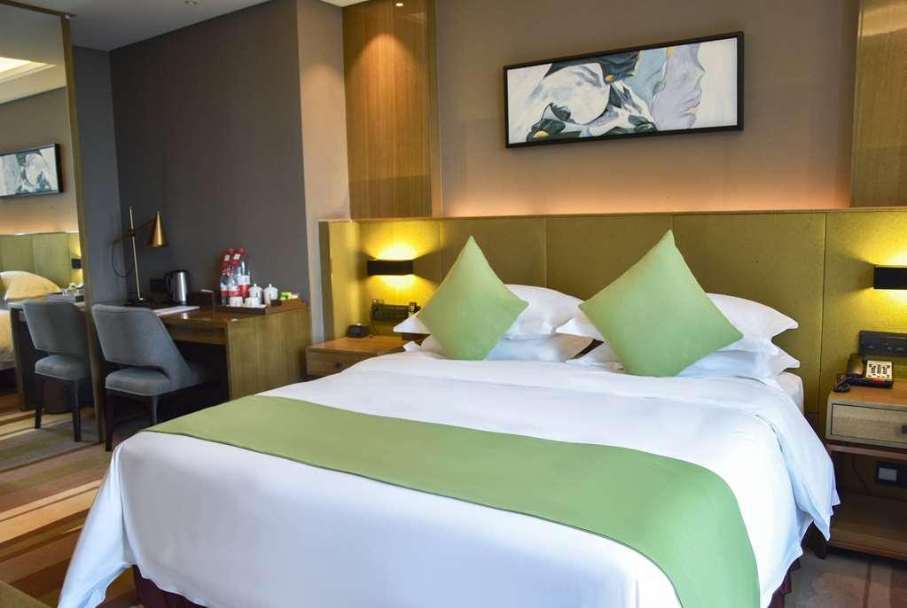 Leshan Ramada Hotel Habitación foto