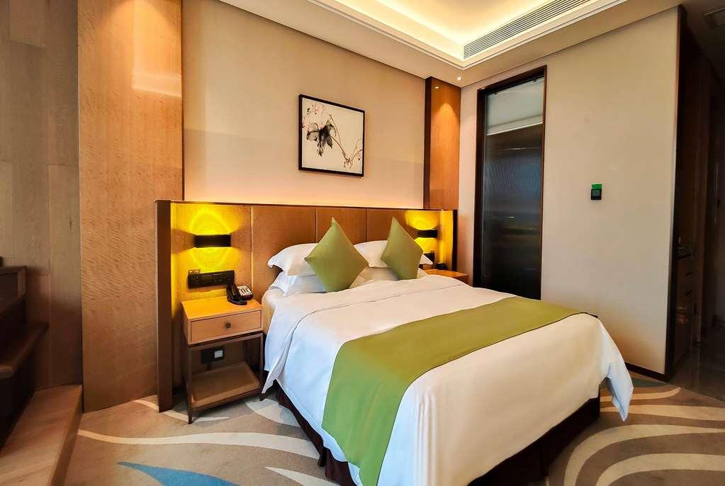 Leshan Ramada Hotel Habitación foto
