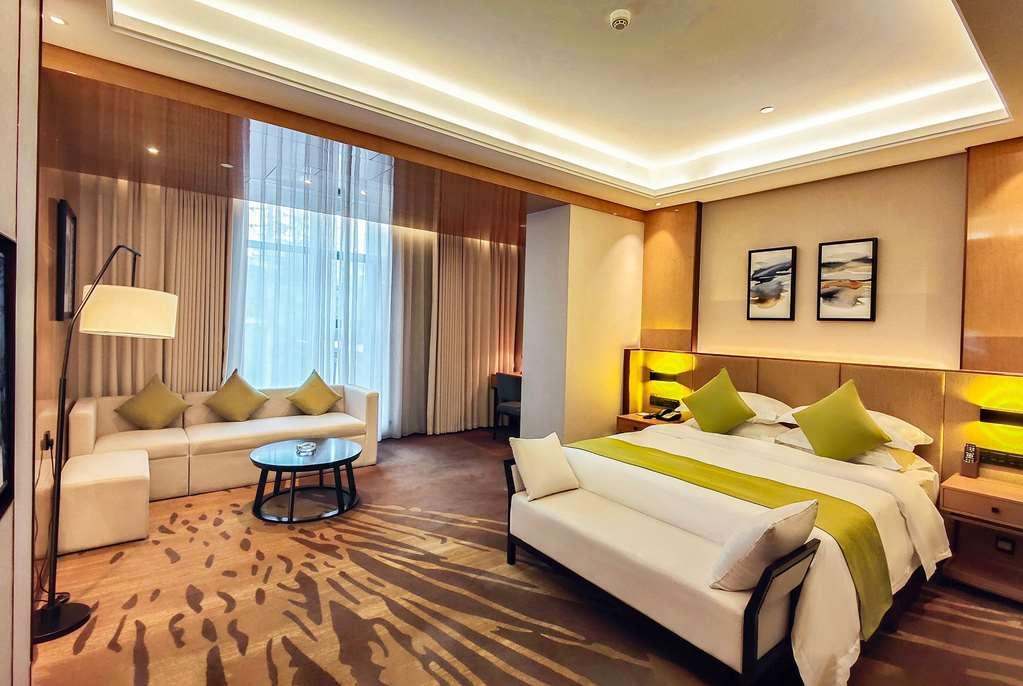 Leshan Ramada Hotel Habitación foto