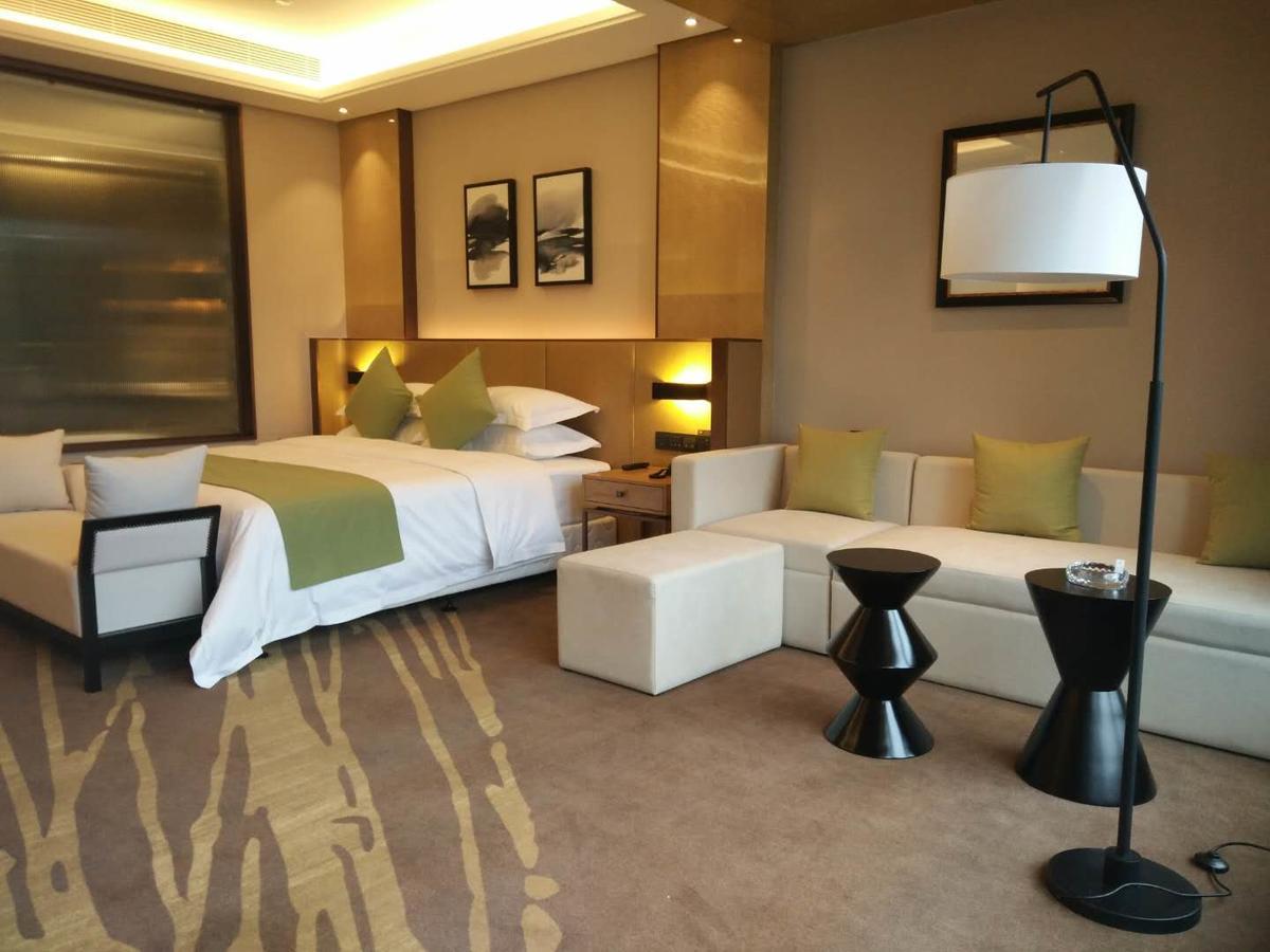 Leshan Ramada Hotel Habitación foto
